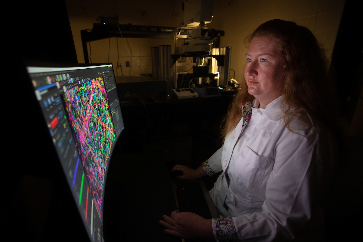 amy nelson on computer in lab